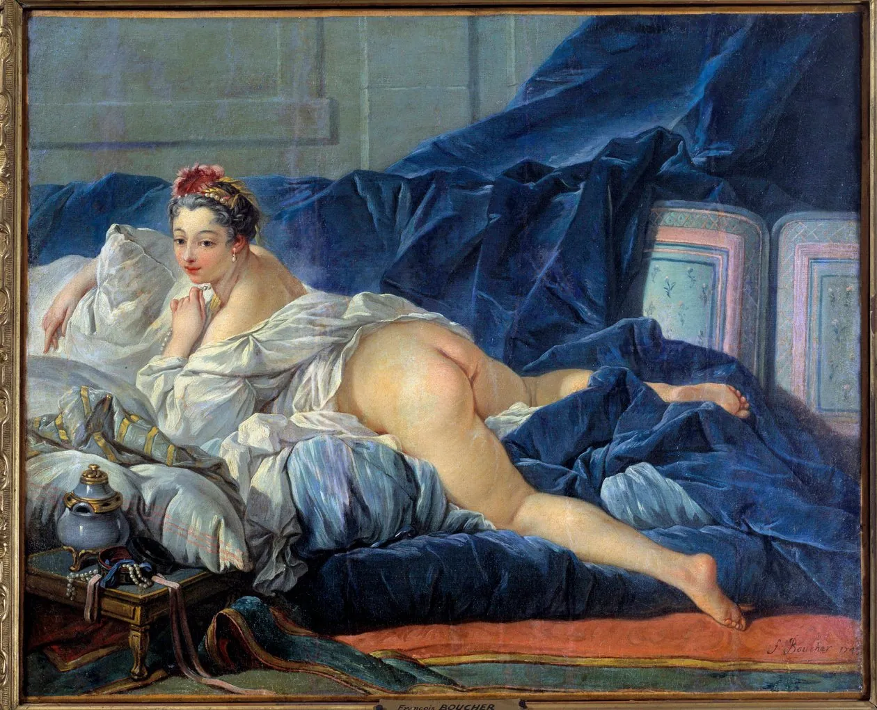 Joven mujer en el canapé, de François Boucher