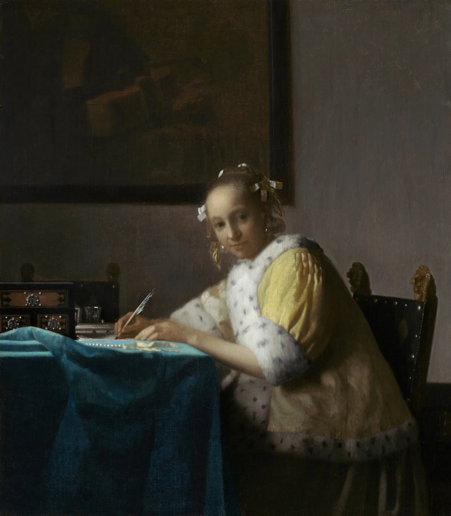 Dama escribiendo una carta, de Johannes Vermeer