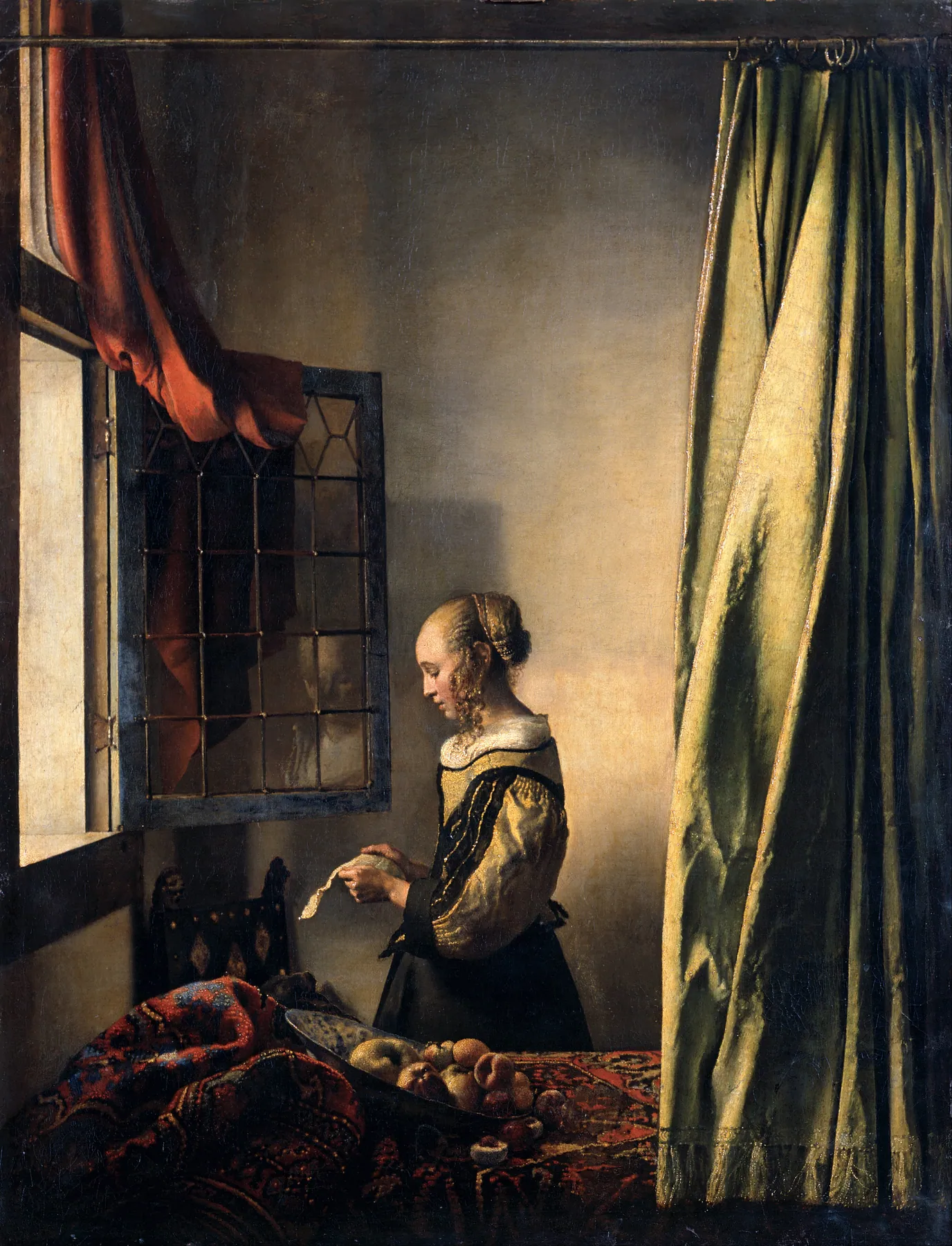 Muchacha leyendo una carta frente a una ventana, de Johannes Vermeer