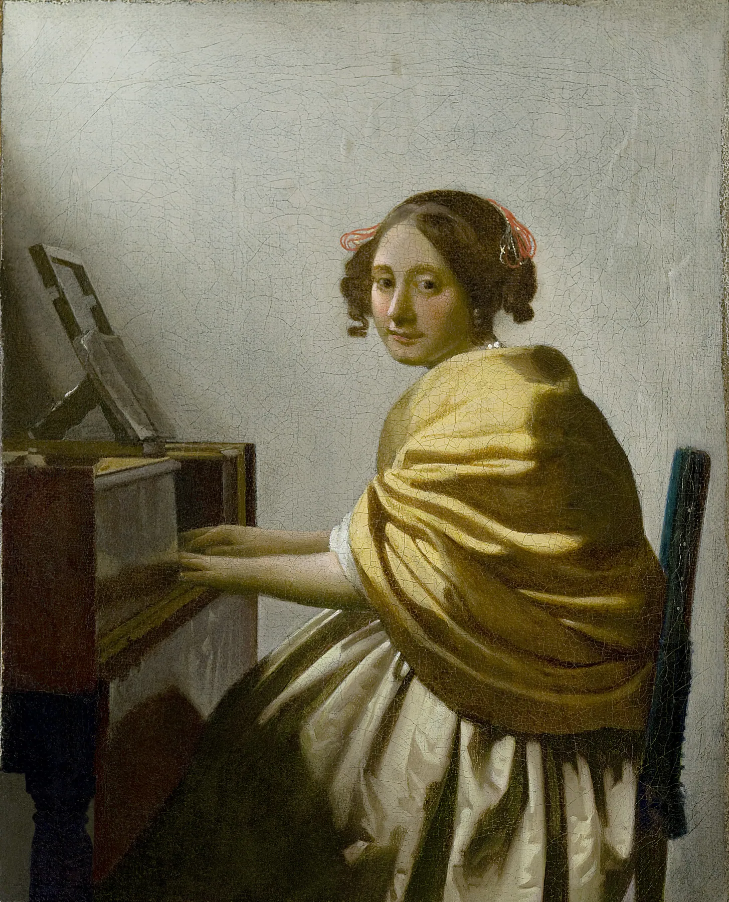 Mujer joven sentada al virginal, de Johannes Vermeer
