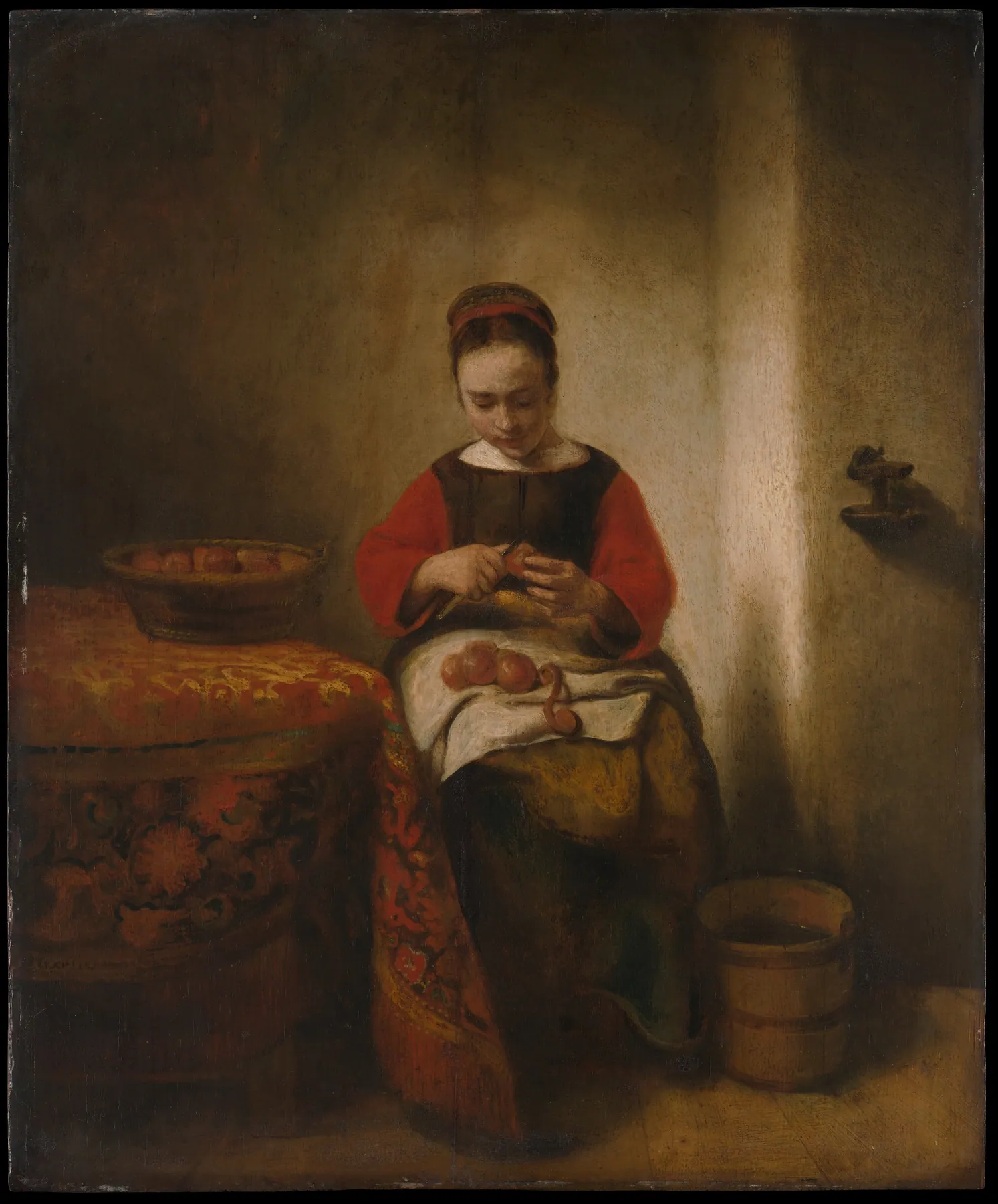 Joven mujer pelando manzanas, de Nicolaes Maes