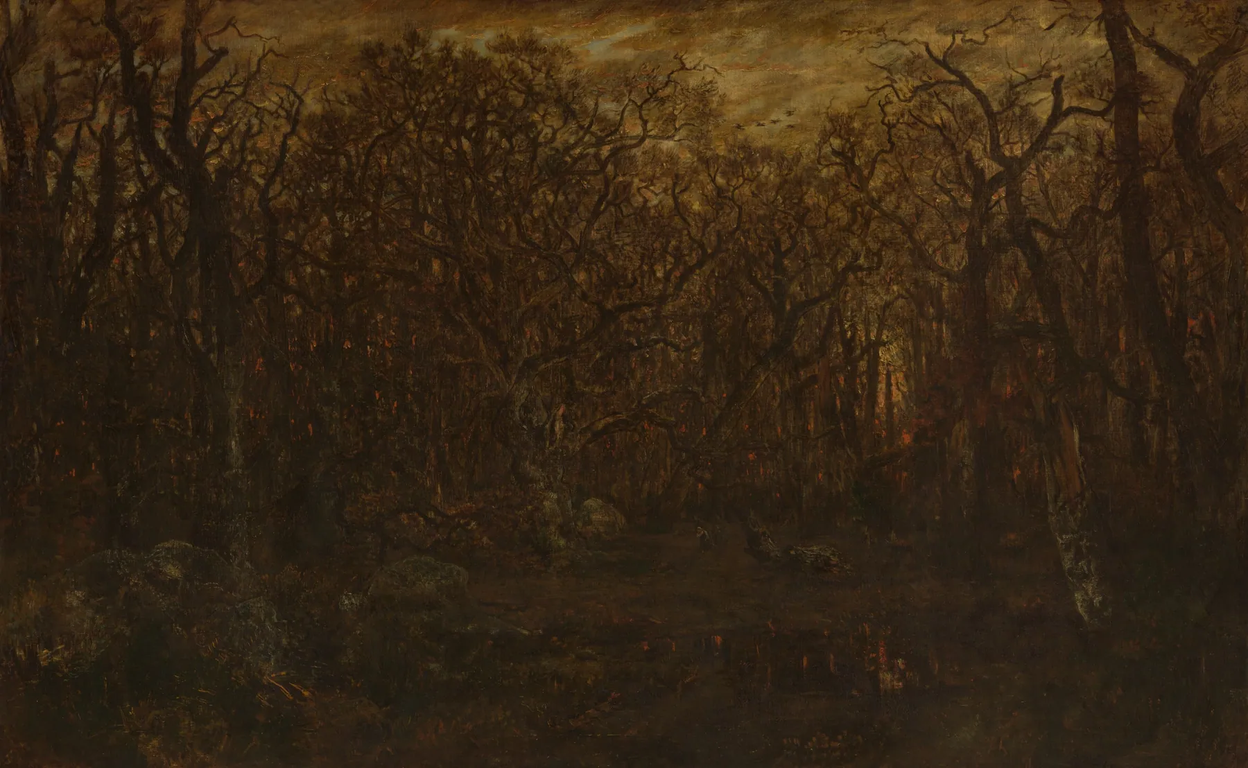 El bosque en invierno al atardecer, de Théodore Rousseau