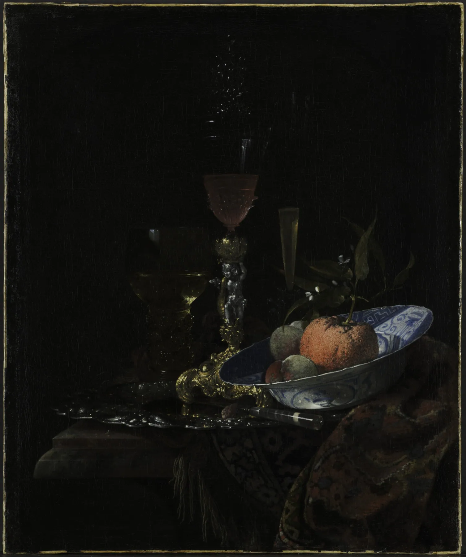 Copa de vino y cuenco de fruta, de Willem Kalf